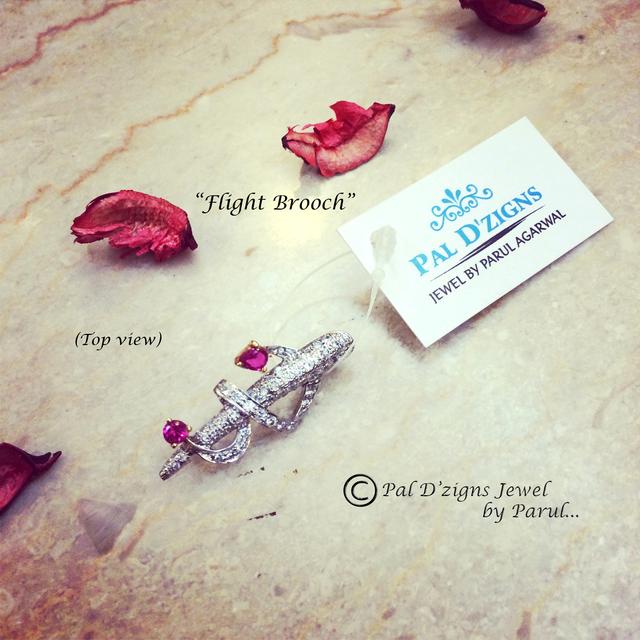 Flight brooch