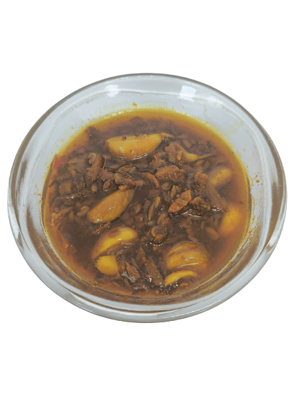 Garlic And Turmeric Pickle In Matka Jar