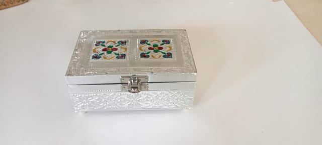 wooden casket with silver metallic carved covering for keeping your valuables