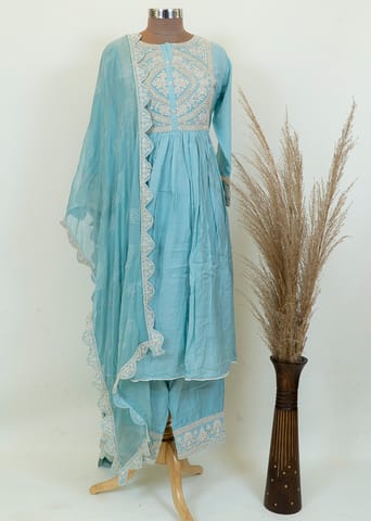 Firozi Color Muslin Embroidered Suit With Chiffon Dupatta And Printed Cotton Bottom