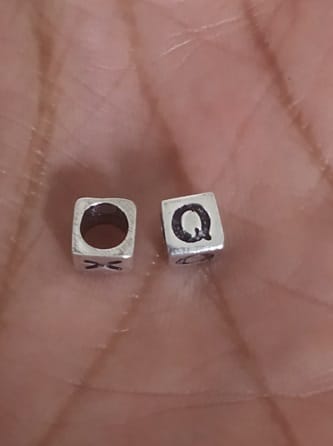 Sterling Silver “Q” Bead