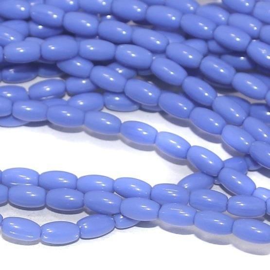 Blue glass oval beads 7x4mm 12 Strings